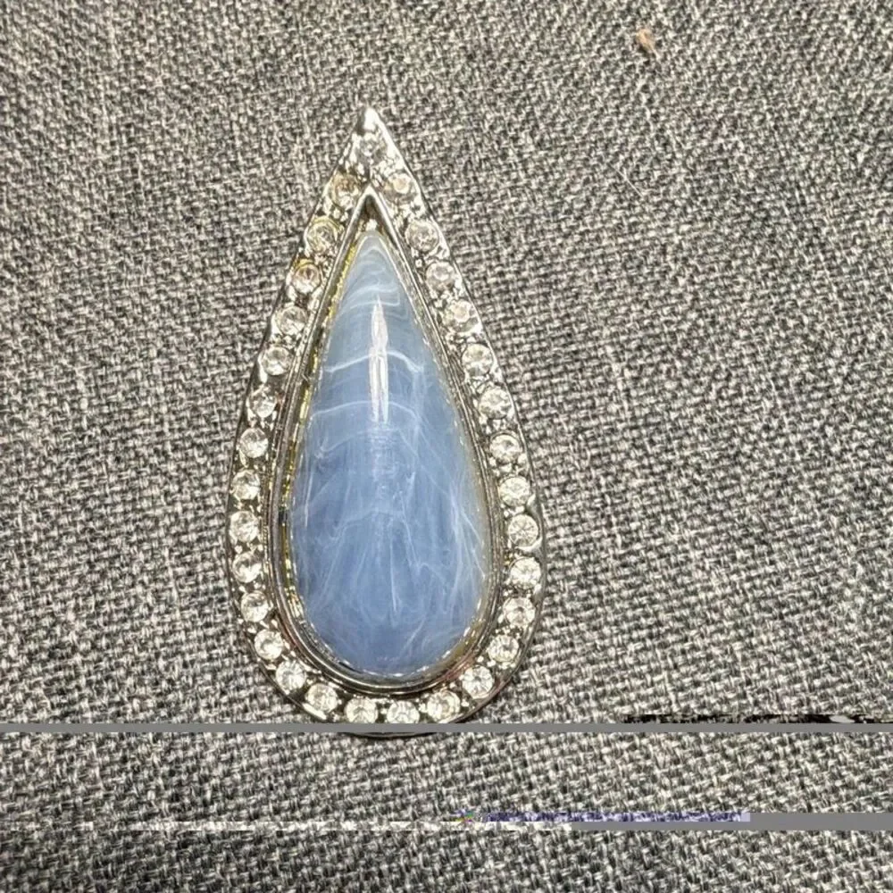 teardrop-shaped blue cabochon gemstone earrings